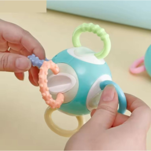 Jucărie pentru Bebeluși – Minge Rotativă cu Inele de Dentiție