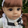 Păpușă Reborn cu Rochie Dantelată și Fundiță Elegantă – 36 cm