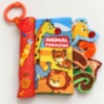 Carte textilă senzorială cu animale, melodii și lumini