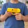 Pistol de jucărie cu acadea retractabilă și două accesorii