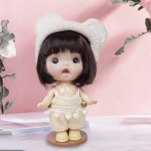 Păpușă Bebe Fetiță cu Căciuliță Urechi și Hăinuțe Pufoase | Jucărie de Colecție și Cadou Adorabil